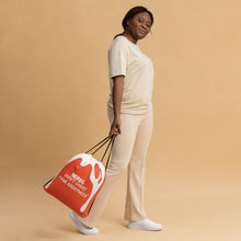 Load image into Gallery viewer, DCYG DRIP White Logo &amp; Orange Drawstring bag
